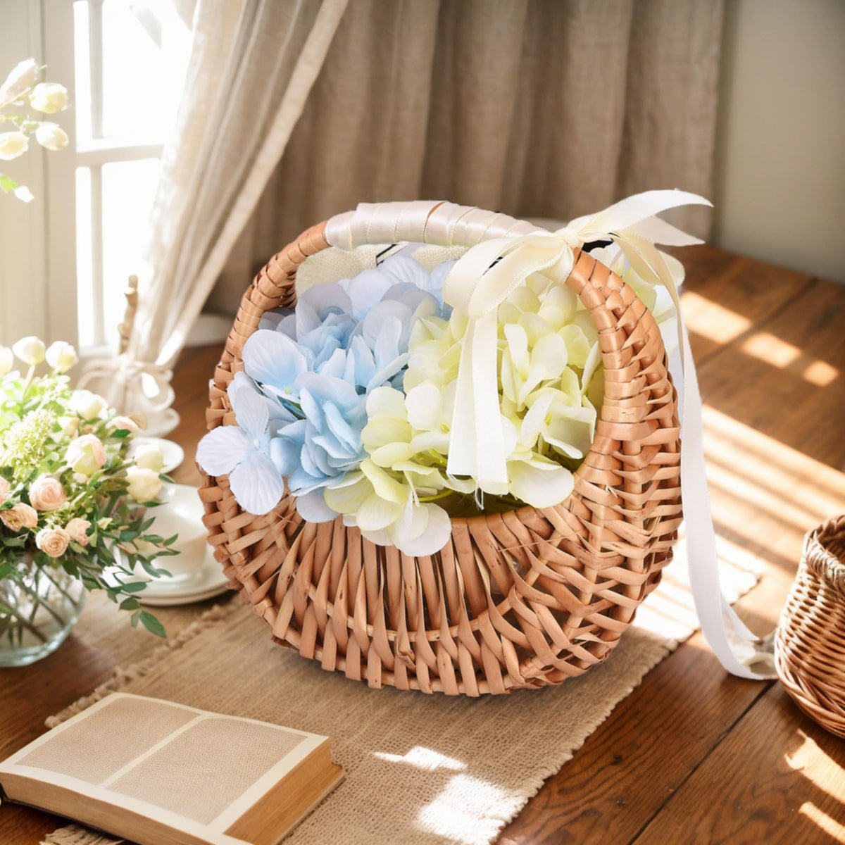 Yiheini wicker basket with handle and white ribbon adds rustic wedding charm.