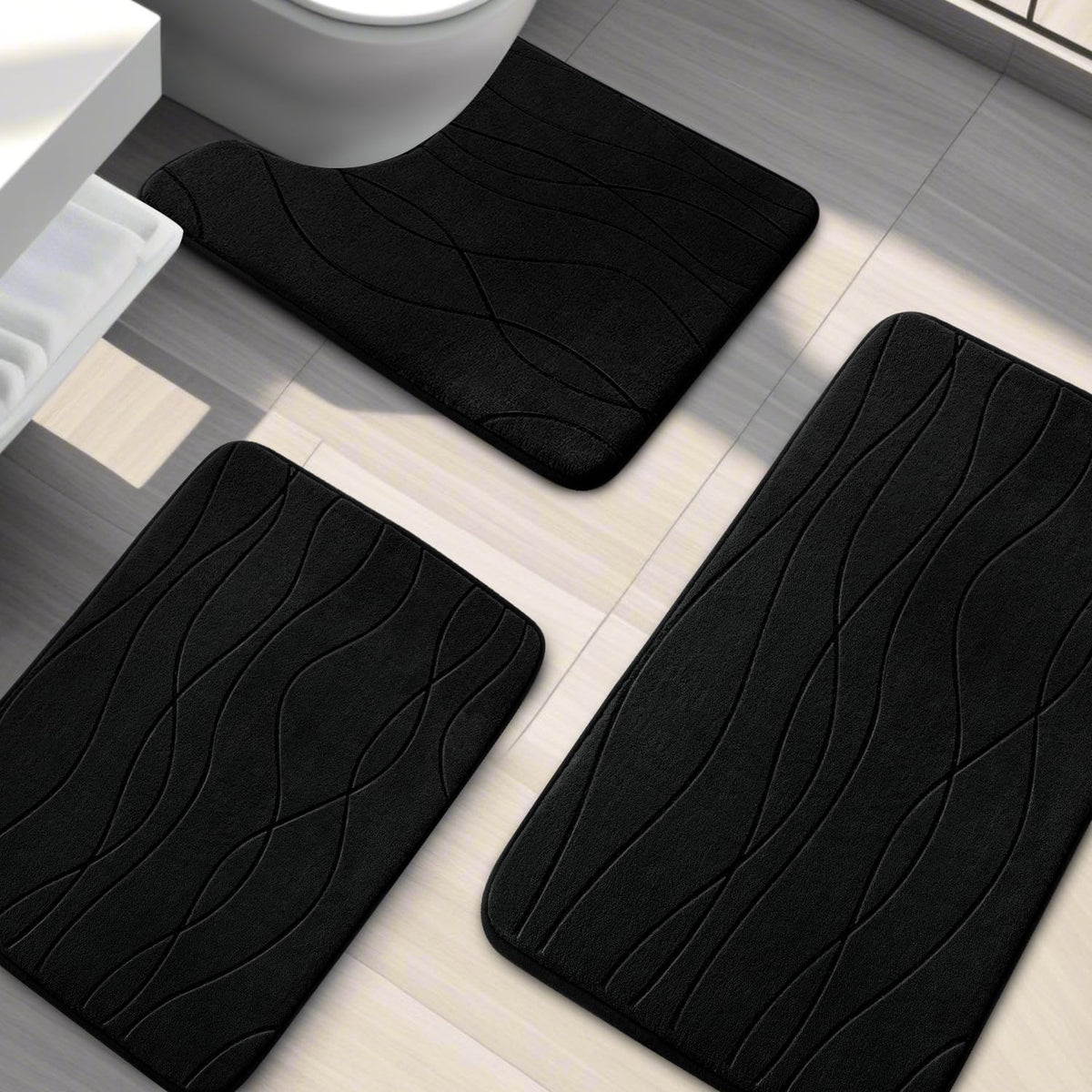 YIHOUSE 3 piece bath rug set arranged in a bathroom layout