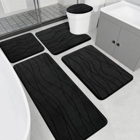 YIHOUSE memory foam black rug set, plush underfoot in a modern bathroom.