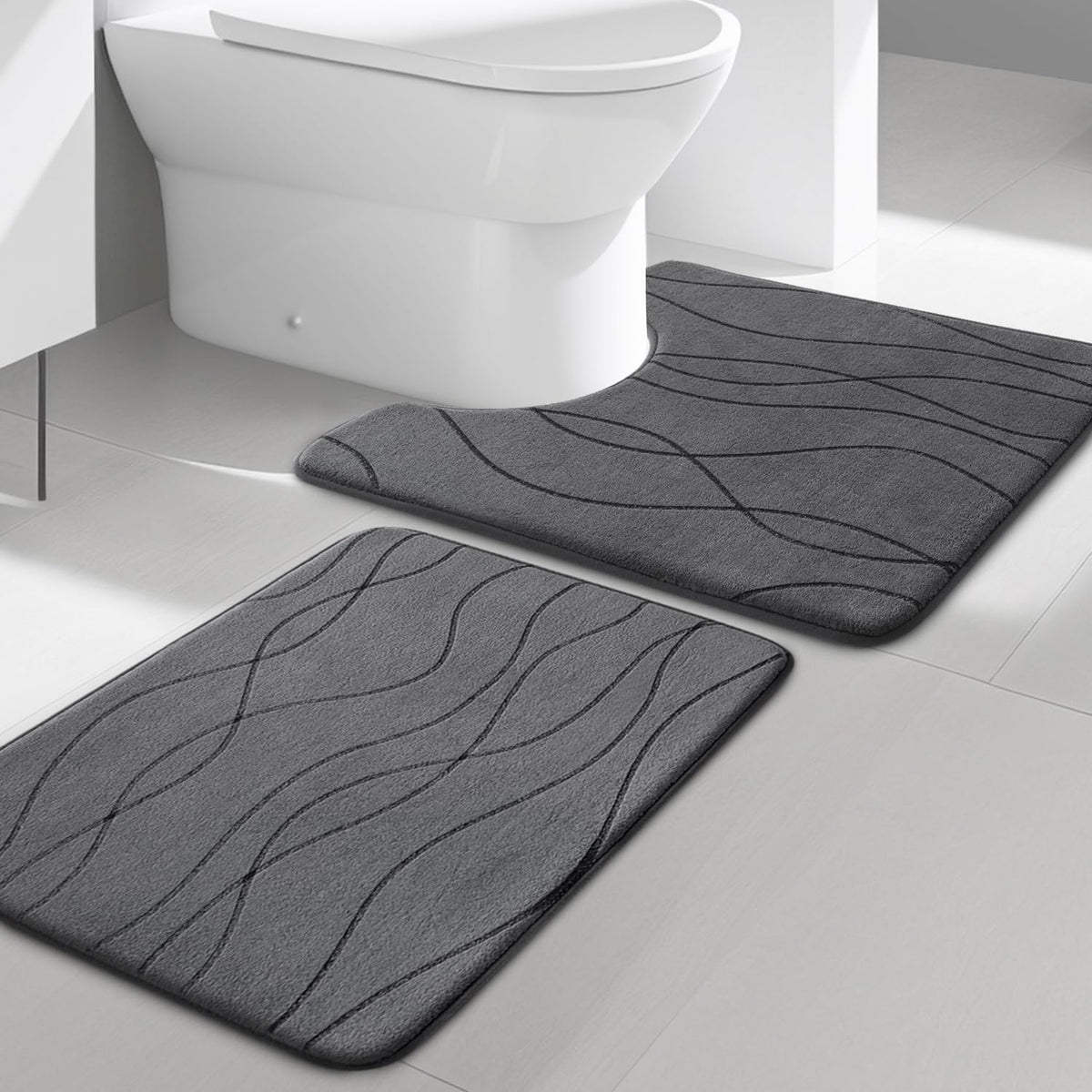 YIHOUSE memory foam grey bathroom rug set in front of tub, plush comfort underfoot.