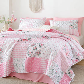 YIKUSH floral quilt in a bright bedroom adds warmth and charm.