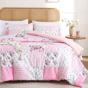 YIKUSH pink floral full comforter close-up showing soft microfiber texture for all-season warmth.