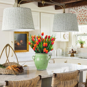 YILIUFA orange tulips provide a bright focal point for outdoor spaces