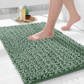 Yimobra bath mat with soft chenille pile for cloud-like warmth underfoot.