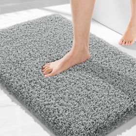 Yimobra bath rug 32x20 ultra-soft surface for plush post-shower steps.