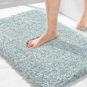 Yimobra 32x20 bath rug with ultra-soft plush surface for comfort.