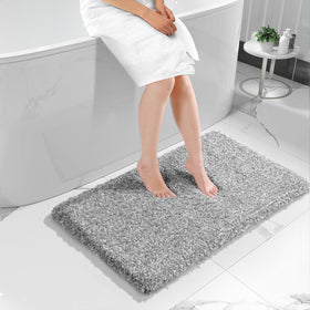 Yimobra luxury bath rug with fluffy-absorbent fibers for quick water pickup.