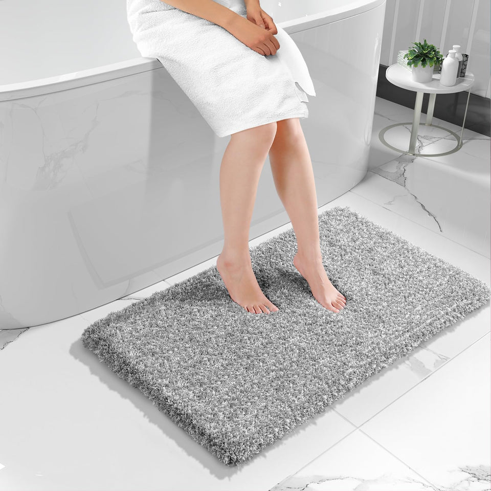 Yimobra luxury bath rug with fluffy-absorbent fibers for quick water pickup.