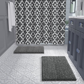 Yimobra bath rug in use at tub edge shows water absorption in action