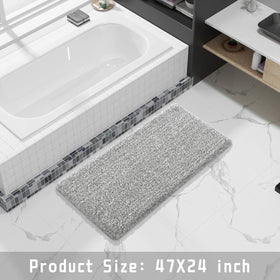 Yimobra rug by tub side enhances safety during showers.