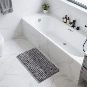 Yimobra gray spa-style rug enhances calm ambiance and floor protection.