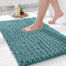 Yimobra bathroom rug non-slip 32x20 in teal enhances safety on wet floors.