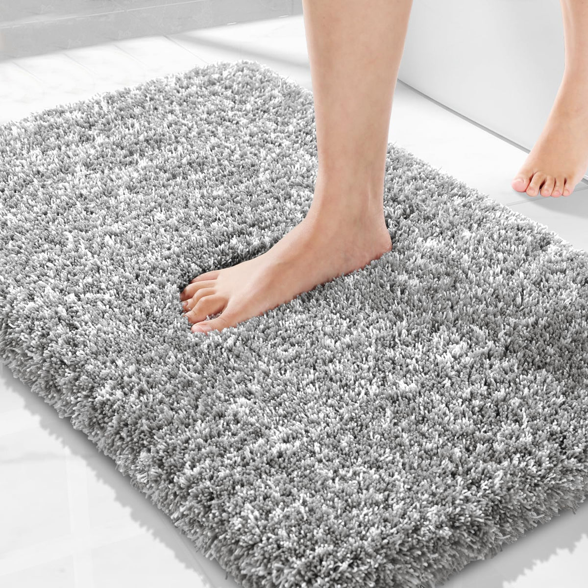 Yimobra bathroom rug with non-slip bottom keeps the mat secure.