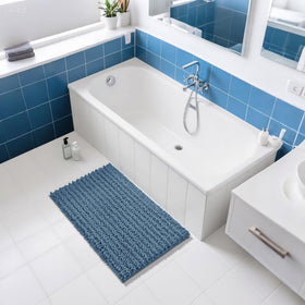 Yimobra denim blue bath mat shown near sink area for everyday use.