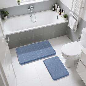 Denim blue bath rug display showcases versatile styling and set coordination.