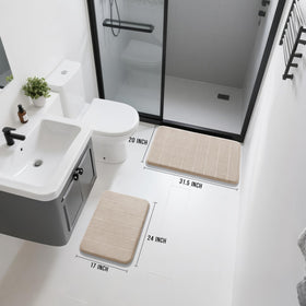 Small beige bath rug beside sink for quick dry and plush comfort