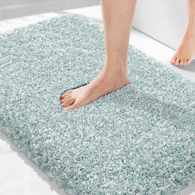 Yimobra sky light blue and white rug adds calm color to bath