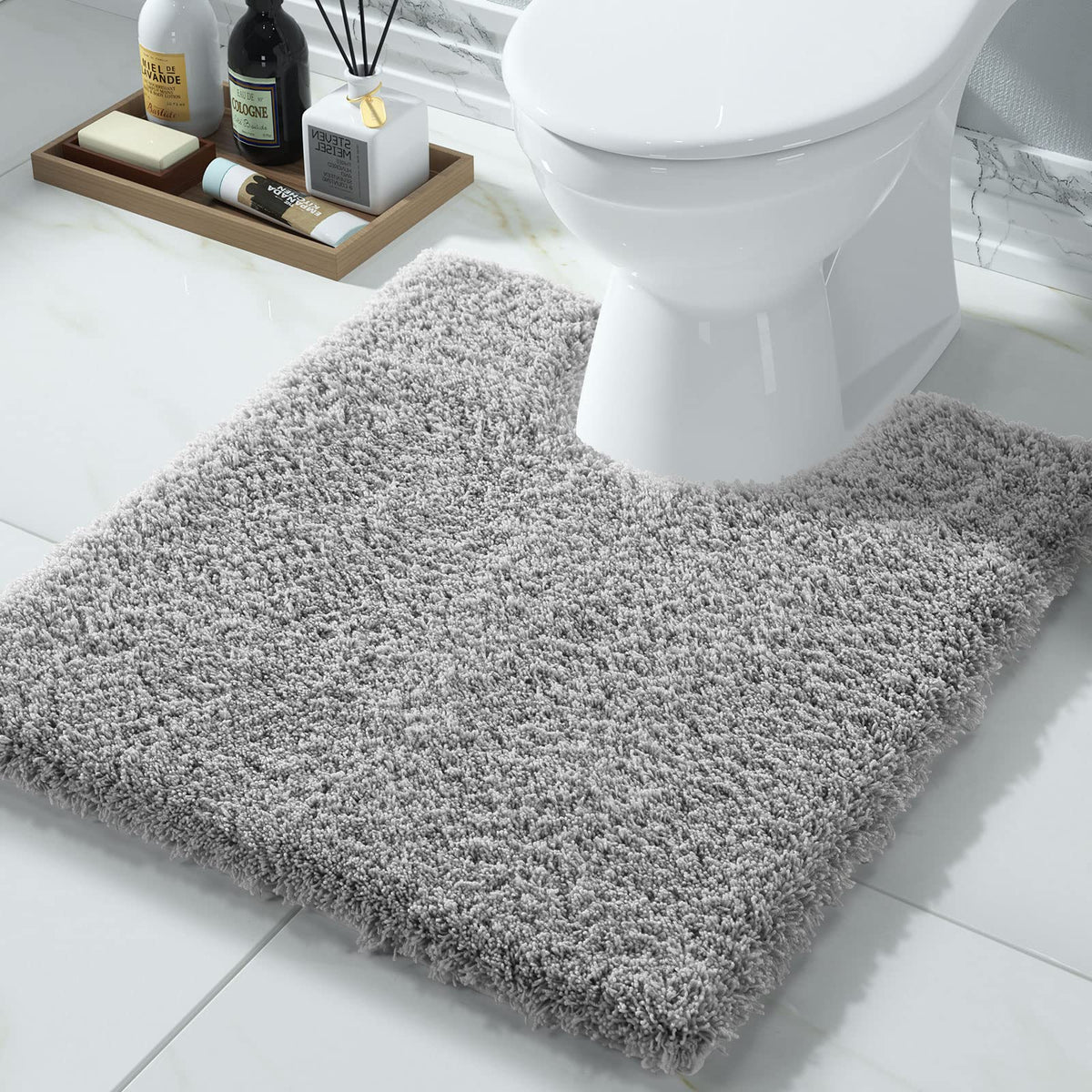 Yimobra U-shaped toilet rug with fluffy plush texture for cozy bathroom comfort.