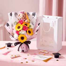 Yinder mini plush grad bear complements the bouquet for a festive keepsake