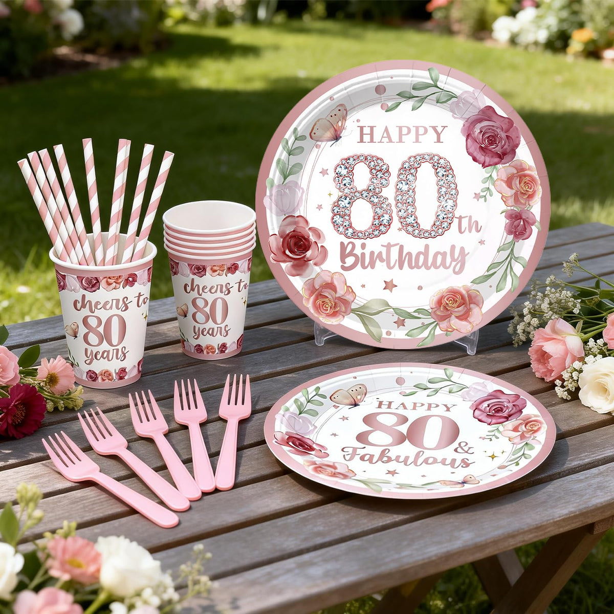 Yingoto 80th birthday napkins in rose gold complete a coordinated table setting.