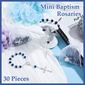 Yinkin table decor idea featuring rosaries for a baptism display