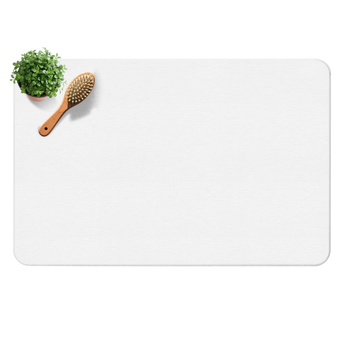 Yinoos diatomite stone bath mat on floor showing quick-dry action.