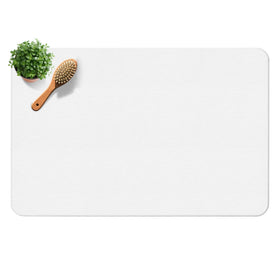 Yinoos diatomite stone bath mat on floor showing quick-dry action.