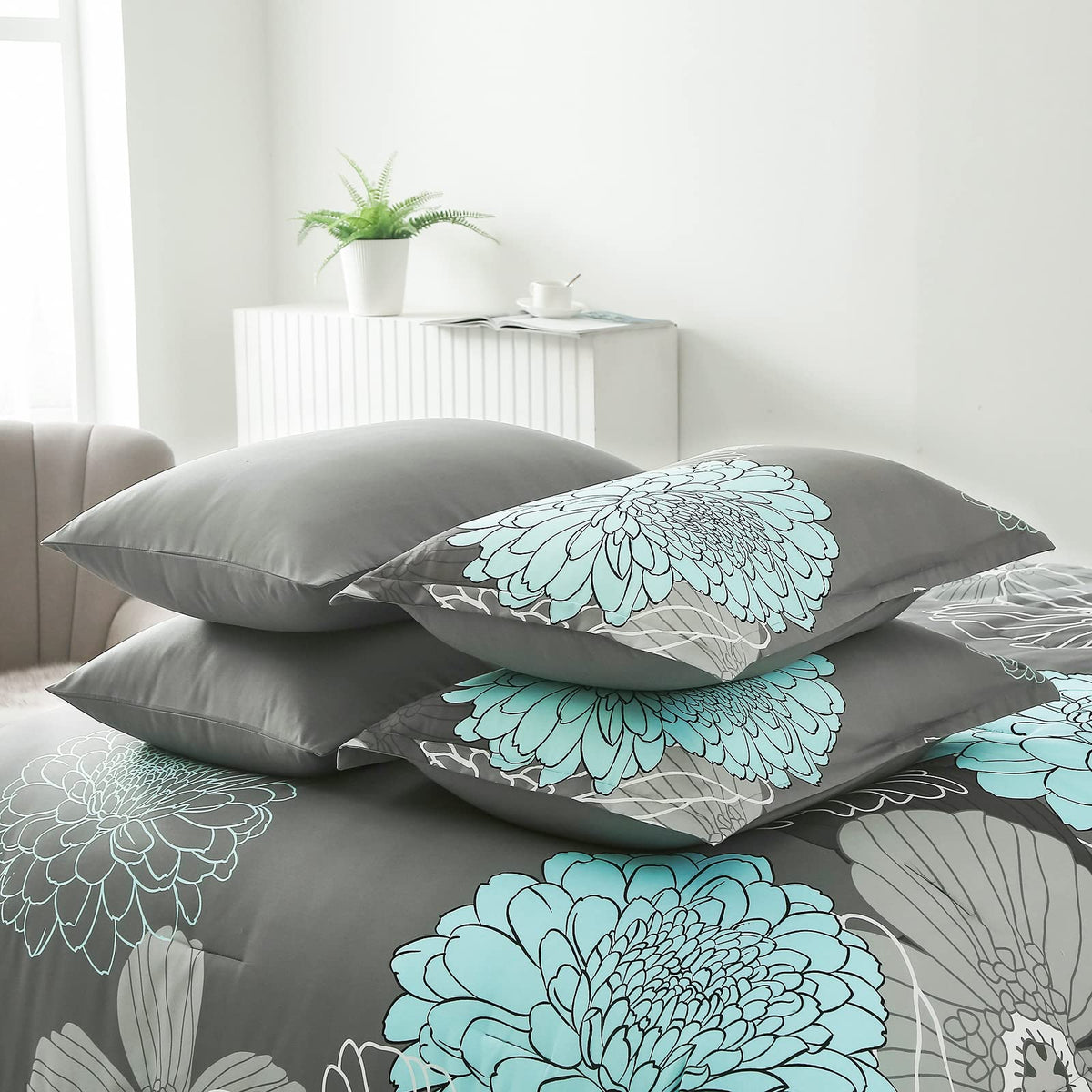 Yiran pillowcases and pillow shams arrangement displaying coordinated floral pattern.