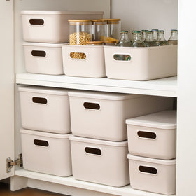 Yishyfier knit-lidded grey bins ideal for closet organization.
