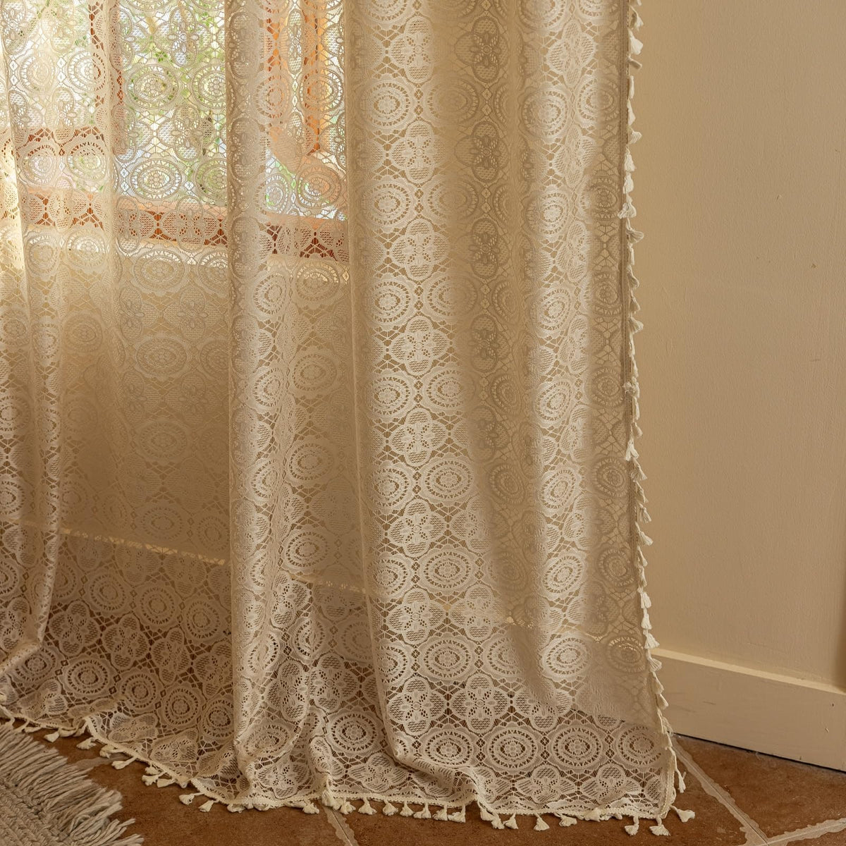 Tassel-edged lace curtains suited for cottagecore and farmhouse styles.