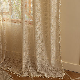 Tassel-edged lace curtains suited for cottagecore and farmhouse styles.