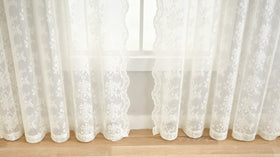 YJ YANJUN cream lace curtains with rod-pocket top for easy hanging.