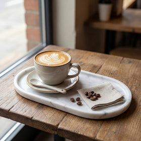 Unsealed natural stone texture of YKAJO tray shows authentic marble finish.