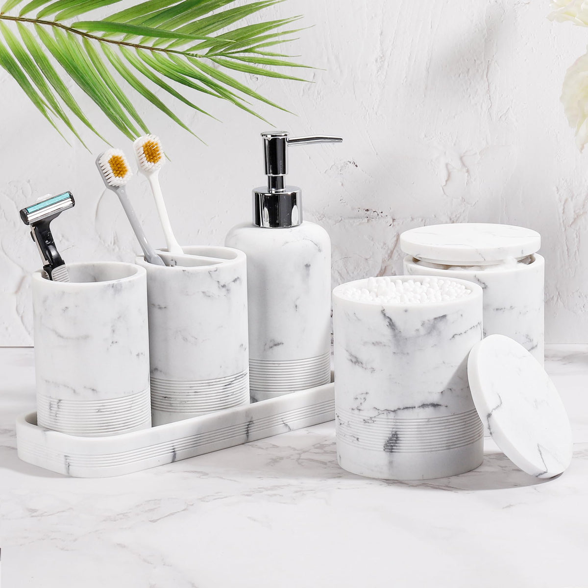 YMXYJM marble white toothbrush holder keeps counter tidy and accessible.