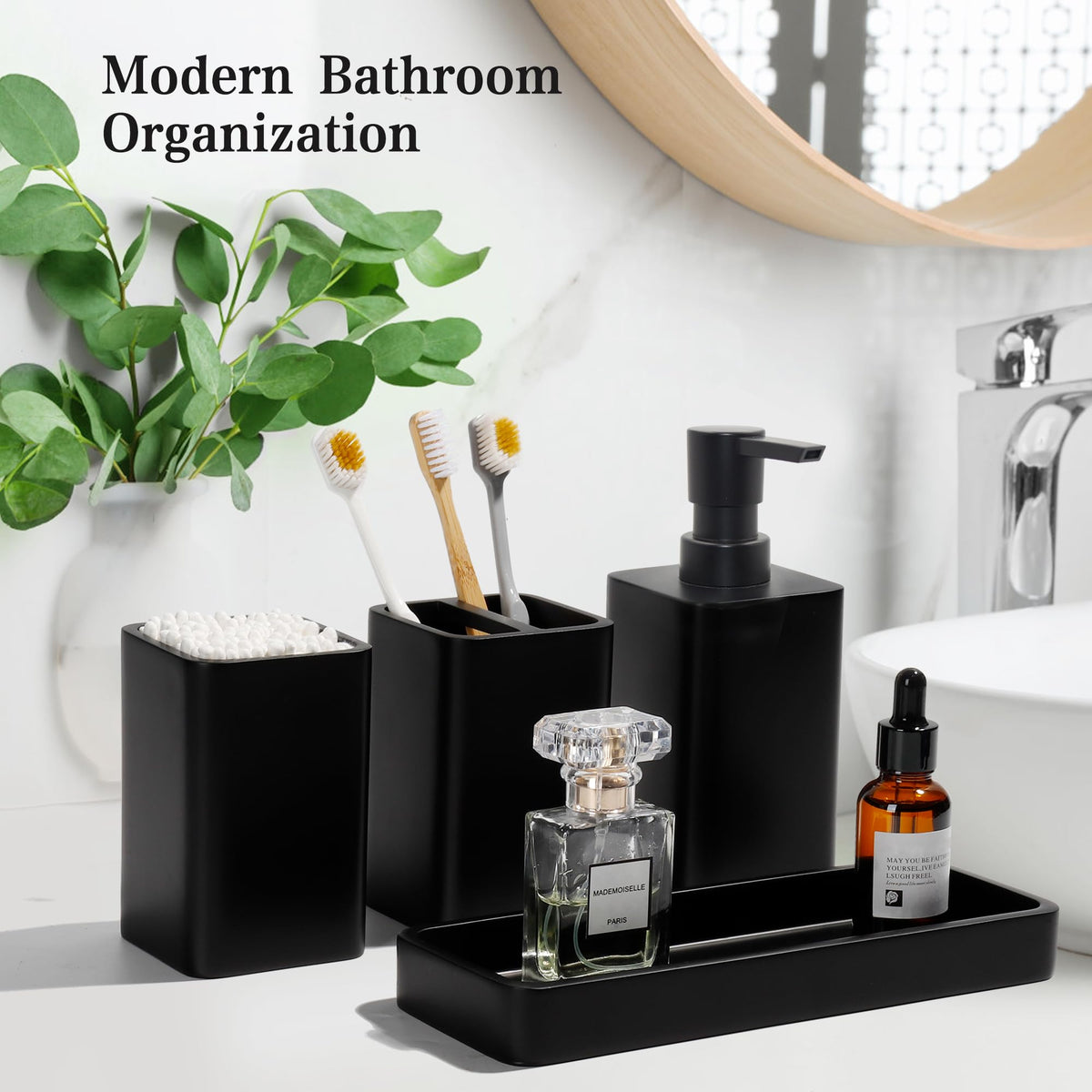 YMXYJM toothbrush holder in matte black helps keep brushes tidy.
