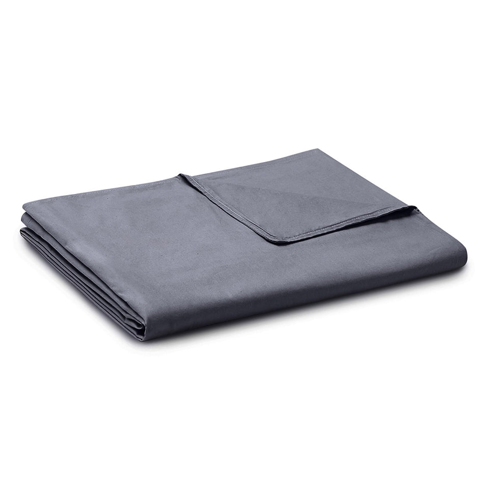 YnM exclusive cotton duvet cover in dark grey on a weighted blanket for soft nights.