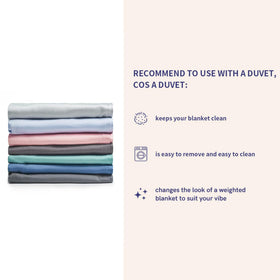 YnM weighted blanket placed on a sofa for versatile all-season use.