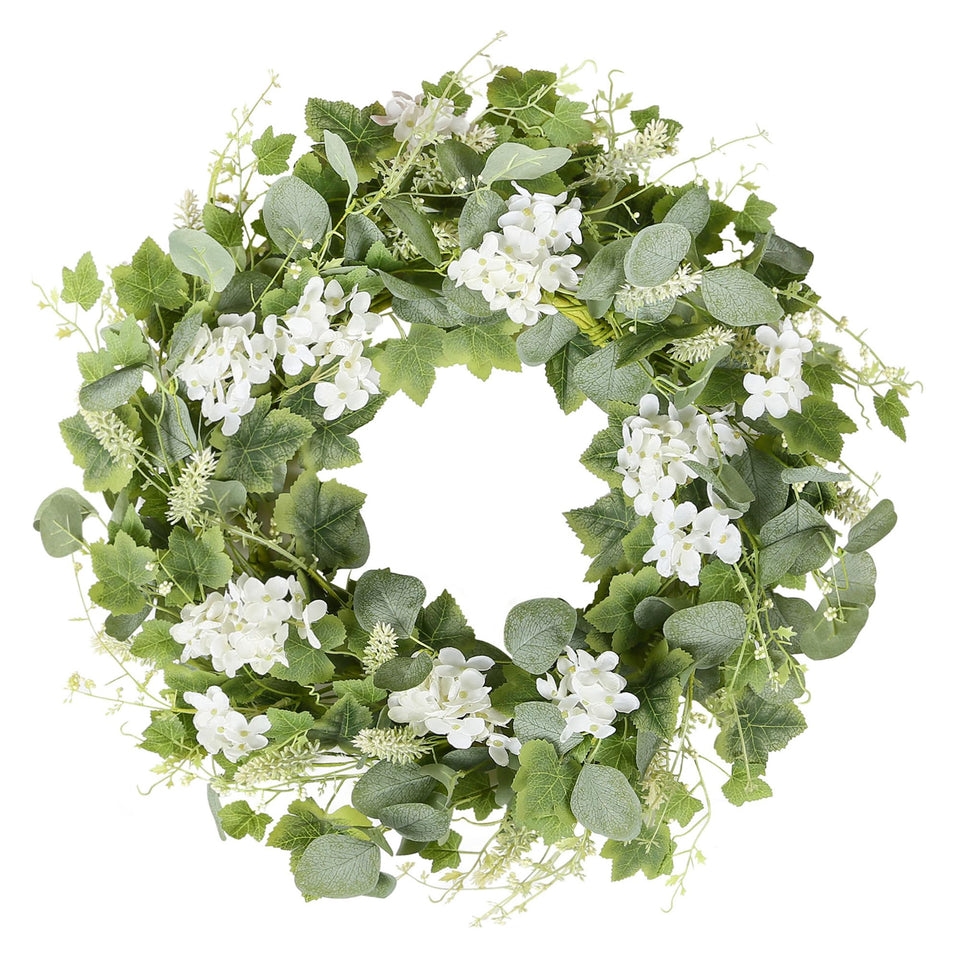 YNYLCHMX wreath on front door with green eucalyptus and white flowers for welcoming curb appeal
