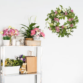 YNYLCHMX handcrafted wreath with silk flowers and iron coils for durability.