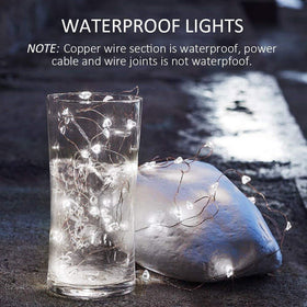 YOEEN IP65 waterproof string lights on silver wire for indoor/outdoor use.