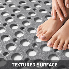 Yolife gray mat on shower floor blends with decor while providing non-slip support