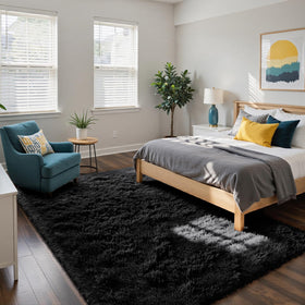 Yongyangjuxin fluffy shag rug in black 5x8 brightens bedrooms with plush warmth.