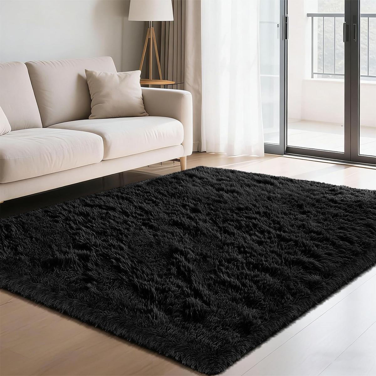 Yongyangjuxin fluffy shag rug in black 4x6 enhances cozy living room ambiance.