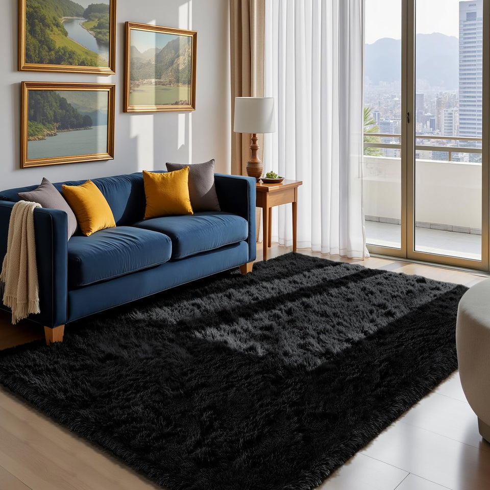Yongyangjuxin fluffy shag rug in black offers velvety comfort underfoot for bedrooms and living rooms.