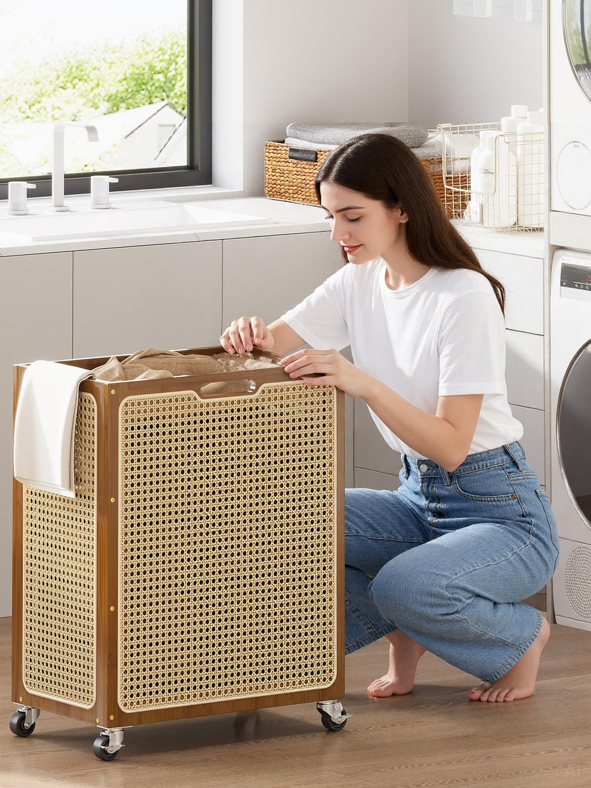 Yonscess boho rattan laundry basket 90L blends with decor while storing clothes.