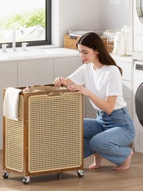 Yonscess boho rattan laundry basket 90L blends with decor while storing clothes.