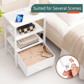Yoobure white night stand beside a bed in a cozy bedroom setup.