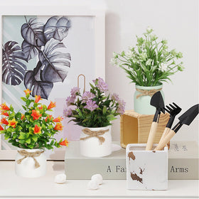 Yoratee artificial flowers create a cozy corner on desks.
