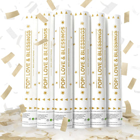 Yorr white and gold confetti poppers illuminate outdoor weddings