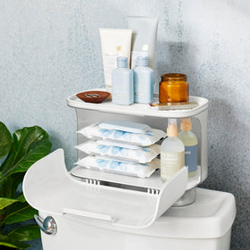 YouCopia Hideaway suction cups gripping a flat tank lid for stability